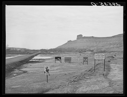 Signs along highway U.S. 30 approaching Green River. Wyoming
