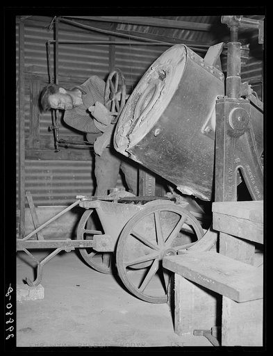 Untitled photo, possibly related to: Pouring molten gold into brick. El Dorado Canyon, Clark County, Nevada