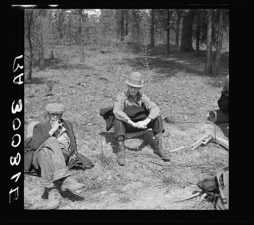 Untitled photo, possibly related to: Lumberjacks resting by roadside near Littlefork, Minnesota