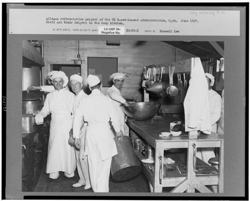 Chefs and helpers in the camp kitchen. Allegan Project, Michigan