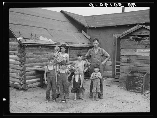 Untitled photo, possibly related to: Art Simplot and family in front of their house near Black River Falls, Wisconsin