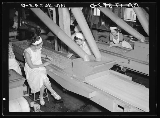 Girls checking quality of peas at canning factory. Sun Prairie, Wisconsin