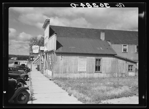 Corrugated metal-sided building. Tower, Minnesota