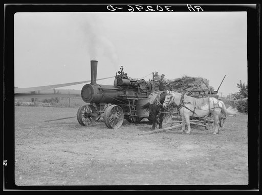 Steam-operated threshing machine near Kewanee, Illinois