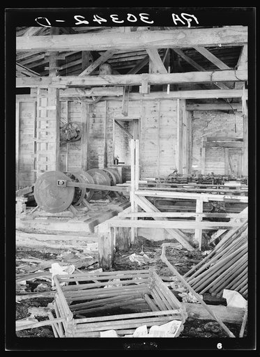 Machinery in abandoned excelsior mill. Ericsburg, Minnesota