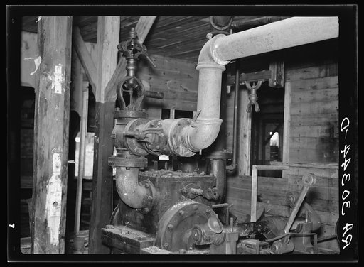 Machinery in abandoned excelsior mill. Ericsburg, Minnesota