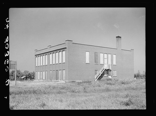 Boarded up and abandoned consolidated school in Gemmel, Minnesota. Logging "bust" town