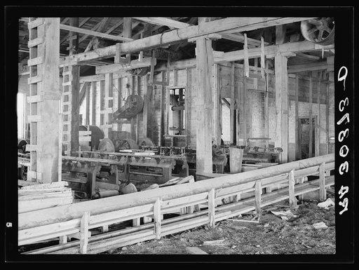 Untitled photo, possibly related to: Machinery in abadoned excelsior mill. Ericsburg, Minnesota