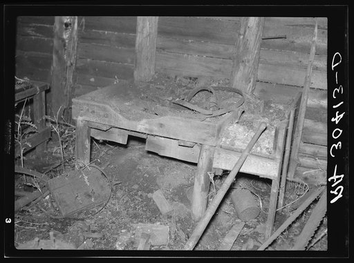Untitled photo, possibly related to: Remains of blacksmith's forge. Abandoned lumber camp. Craigville, Minnesota