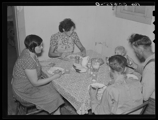 Family of E. Gorder eating dinner. Williams County, North Dakota