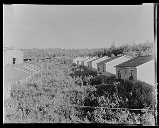Abandoned miners' houses at Babbitt, Minnesota. Mine has not operated since about 1925, but still is kept in repair with remote prospect of opening at some future date