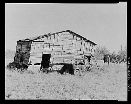 Old barn and stock loading runway at Funkley, Minnesota