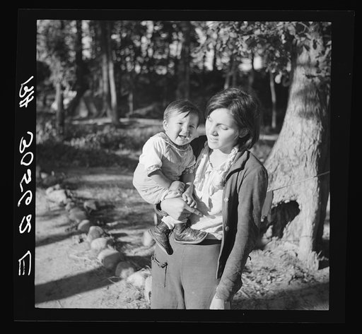 Indian girl and her baby cousin. Blueberry pickers' camp, Littlefork, Minnesota