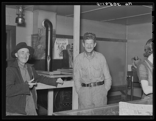 Lumberjacks in a saloon on Saturday night. Craigville, Minnesota