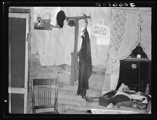 Part of living room in farmhouse of cut-over area near Northome, Minnesota