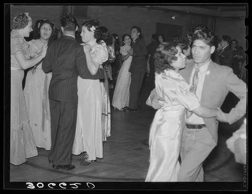 Dance at the Mexican Independence Day celebration. The younger Mexicans are thoroughly Americanized and have retained few of the Mexican customs