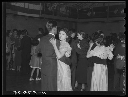 Dance at the Mexican Independence Day celebration. The younger Mexicans are thoroughly Americanized and have retained few of the Mexican customs
