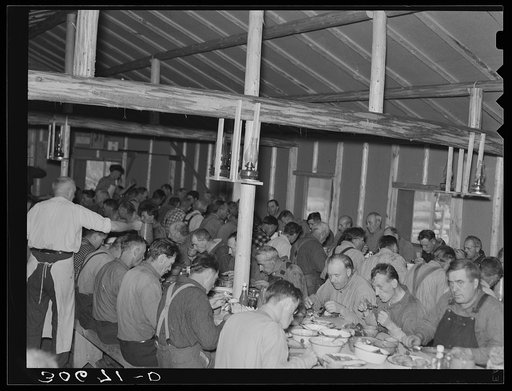 Lumberjacks at dinner at lumber camp near Effie, Minnesota