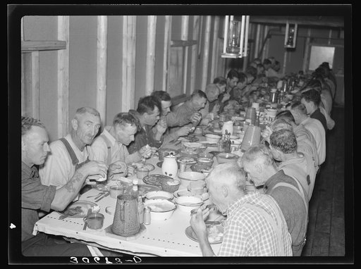 Lumberjacks at dinner. Camp near Effie, Minnesota