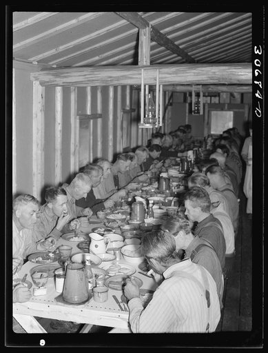 Lumberjacks at dinner. Camp near Effie, Minnesota