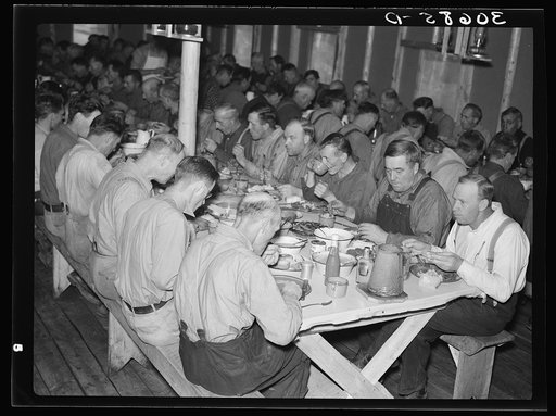 Lumberjacks at dinner. Camp near Effie, Minnesota