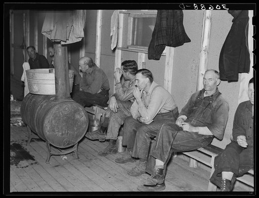 Lumberjacks waiting for the dinner horn. Camp near Effie, Minnesota