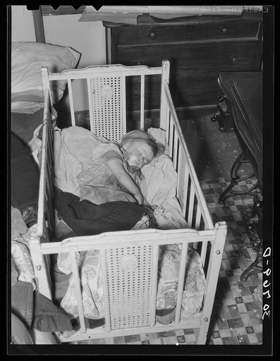 Sleeping child in farm home. Williams County, North Dakota