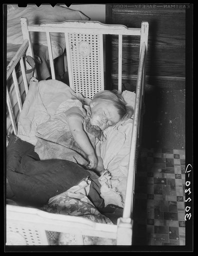 Sleeping child in farm home. Williams County, North Dakota
