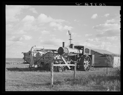 Old steam tractor and threshing machine, idle for nine years. Ellisville Township, Williams County, North Dakota