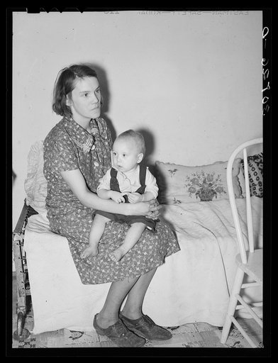Mrs. Shotbang and baby she delivered herself. She has had no aid in the births of her four children. Near Williston, North Dakota