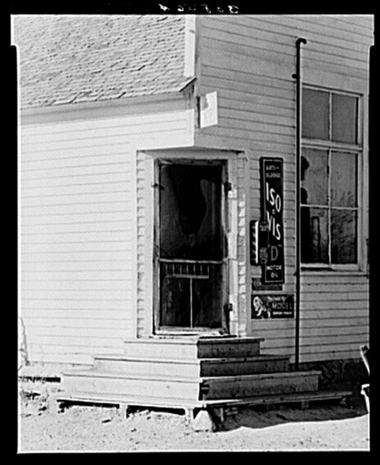 Entrance to small country store. Williams County, North Dakota
