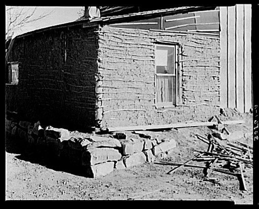 Detail of mud and stick house with tarpaper addition. Williams County, North Dakota