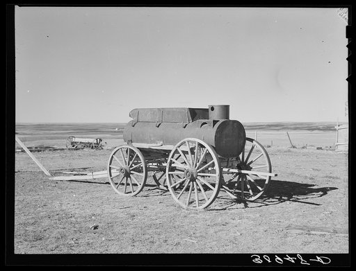 Wagon used for hauling water for the old steam tractors. Antelope, Montana