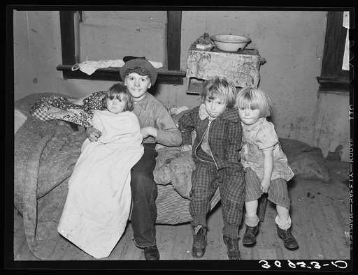 Drought children in farm home. Sheridan County, Montana