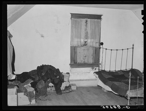 Upstairs bedroom in farmhouse of John Baker, farmer of Divide County, North Dakota