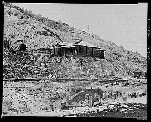 Former superintendent's house with remains of railroad station in foreground. Cambria, Wyoming