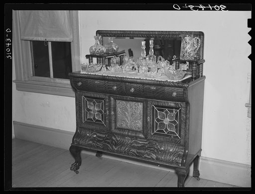 Sideboard with cut glass, home of Jim Hardin. Two Bit Creek, near Deadwood, South Dakota