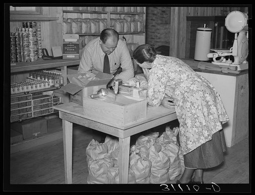Southeast Missouri Farms. Buying supplies in cooperative store. La Forge, Missouri