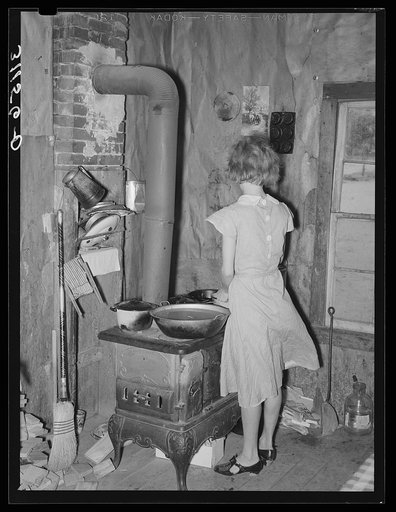 Southeast Missouri Farms. Daughter of sharecropper in corner of shack home near La Forge project, Missouri