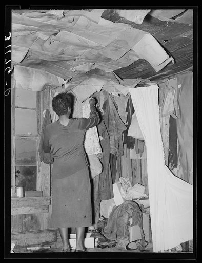 Untitled photo, possibly related to: New Madrid County, Missouri. Space for clothes storage in sharecropper shack