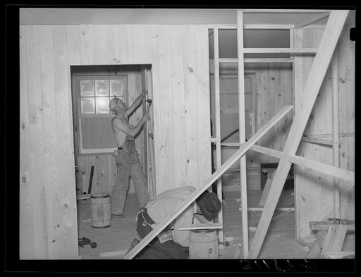 Southeast Missouri project field. House erection. Interior partition being put in place