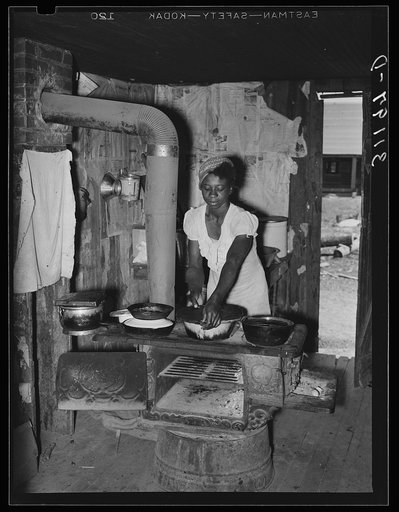 Southeast Missouri Farms. Sharecropper wife preparing midday meal