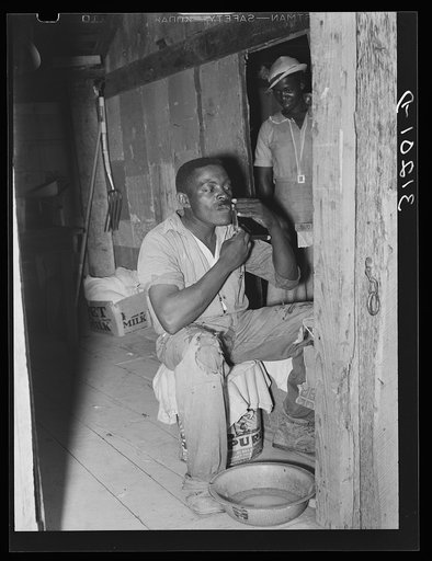 Southeast Missouri Farms. Negro FSA (Farm Security Administration) client, former sharecropper, shaving