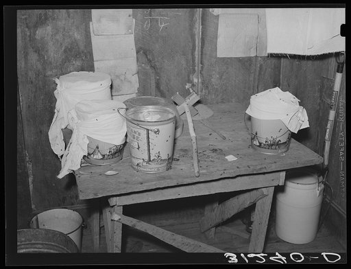 Southeast Missouri Farms. Top of table with pails and butter dasher in sharecropper shack