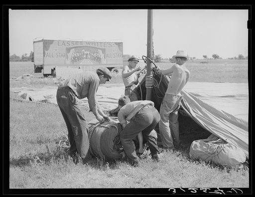 Erecting tent for Lasses-White show. Sikeston, Missouri