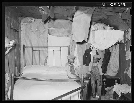 Bedroom in home of sharecropper who will work under tenant purchase program. Near Caruthersville, Missouri