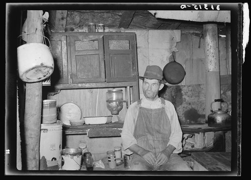 Resident of Tin Town, Caruthersville, Missouri, in his shack home