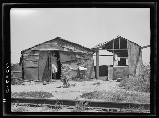 Shack home across the railroad tracks. Tin Town, Caruthersville, Missouri