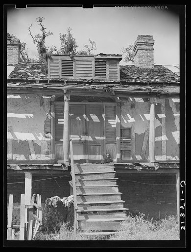 Entrance to old Trepagnier plantation house near Norco, Louisiana. This house is now occupied by Negroes