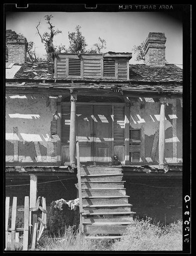 Untitled photo, possibly related to: Entrance to old Trepagnier plantation house near Norco, Louisiana. This house is now occupied by Negroes